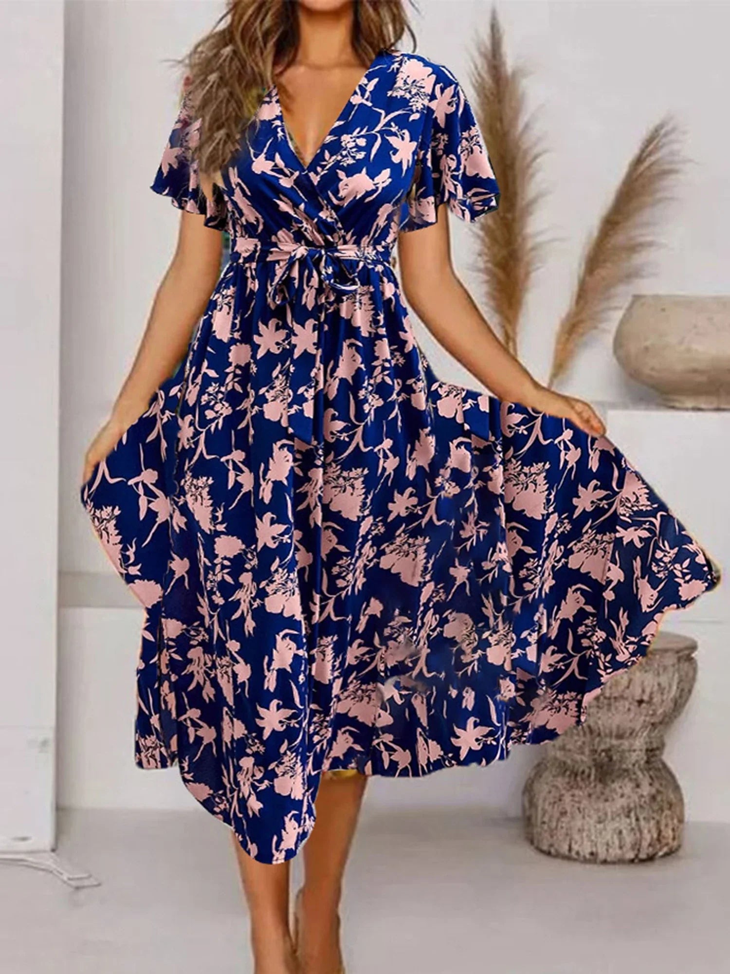 Evy | Élégante robe midi à imprimé floral romantique