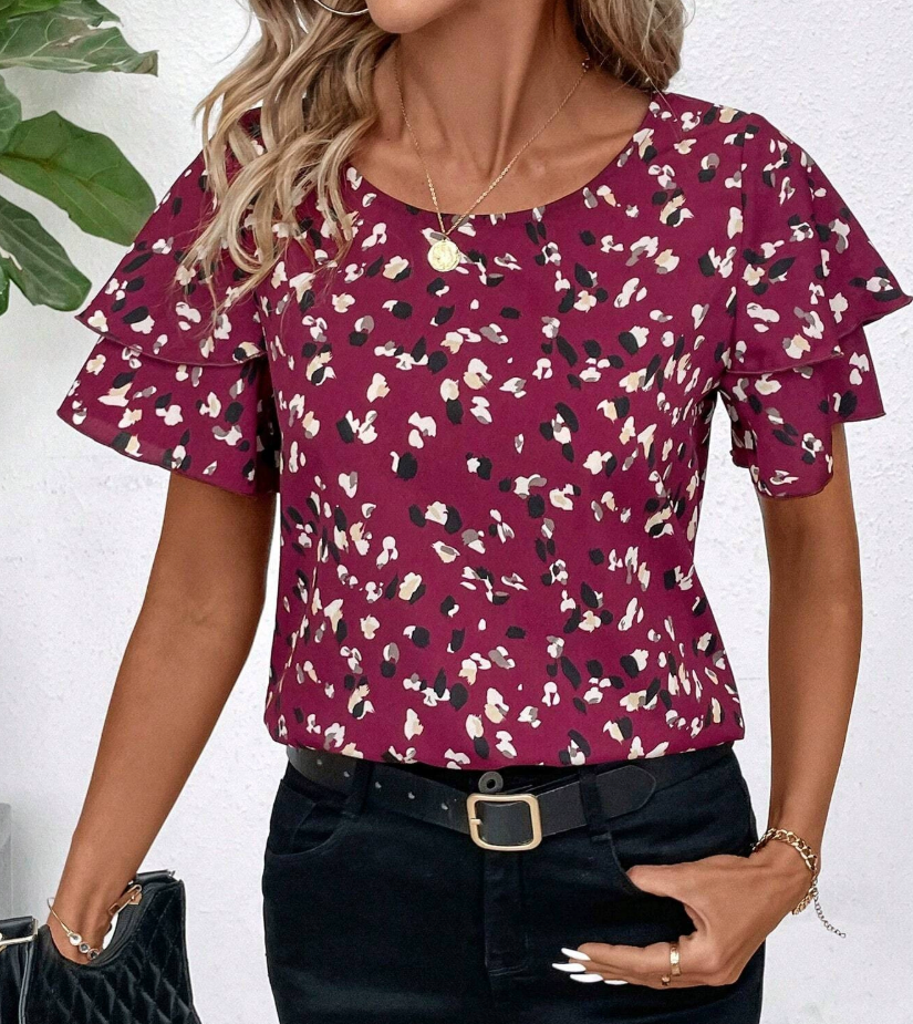 Regina | Blouse à la mode avec des volants amusants